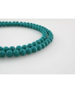 Staklene gumirane perle 6 mm, rupa oko 1mm. Niz sadrži oko 135 perli. SP-GUM106