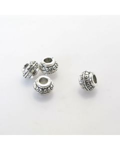 Metalna perla 8,5 x 6,5  mm, rupa oko 3.5 mm- boja antik srebra ( R154AS )