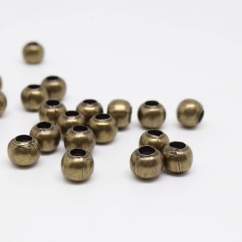 Metalne perle/razdelnici 6 mm. Pakovanje sadrži 100 komada - boja antik bronza .(100434)