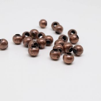 Metalne perle/razdelnici 4 mm. Pakovanje sadrži 200 komada - boja antik bakar .(100442)