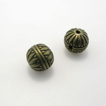 Metalna perla sa 3 rupe , dimenzije 12x11mm , rupe oko 2 mm- boja antik bronza , pakovanje 2 komada ( 3P108AM12 )