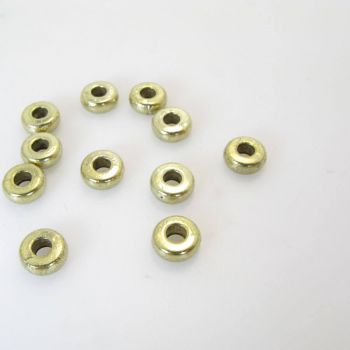 Metalna perla 6.7 x 2.7 mm, rupa oko 2.5 mm- boja antik bronza ( R162AM )