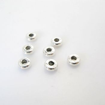 Metalna perla 6.7 x 2.7 mm, rupa oko 2.5 mm- boja antik srebro ( R162AS )