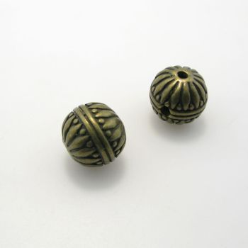 Metalna perla sa 3 rupe , dimenzije 14x13mm , rupe oko 2 mm- boja antik bronza , pakovanje 2 komada ( 3P108AM14 )