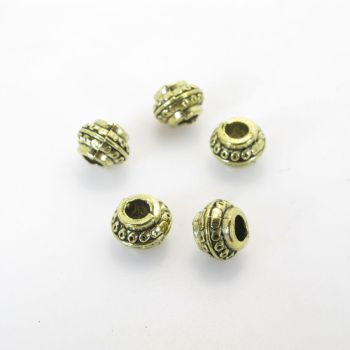 Metalna perla 8,5 x 6,5  mm, rupa oko 3.5 mm- boja antik bronza ( R154AM )