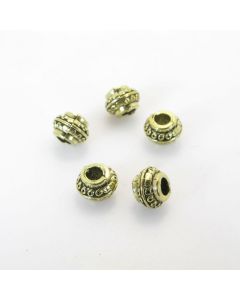 Metalna perla 8,5 x 6,5  mm, rupa oko 3.5 mm- boja antik bronza ( R154AM )