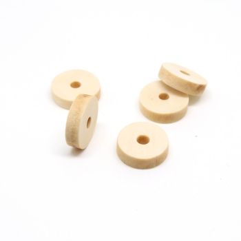 Drvene ukrasne perle. Dimenzije 15x4 mm, rupa oko 3 mm. Natur drvo bez laka i boje.  ( 14129 )