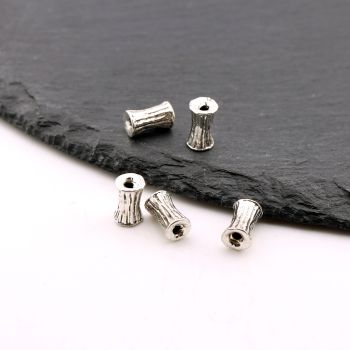 Metalna livena perla 10x6 mm, rupa 2mm…23MK11/12457B