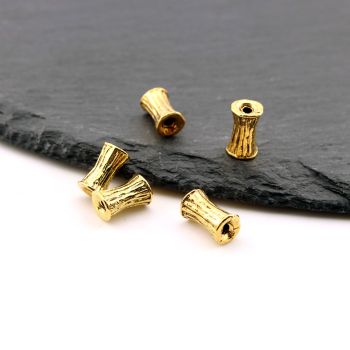 Metalna livena perla 10x6 mm, rupa 2mm…23MK11/12457DZL