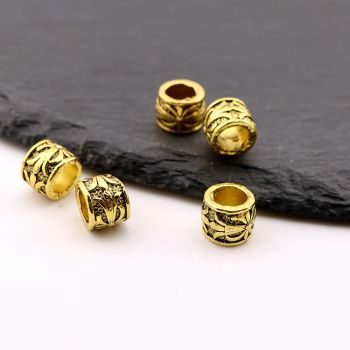 Metalna livena perla 9x7 mm, rupa 6mm…23MK11/13752BZL