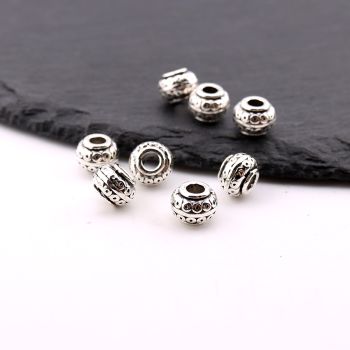 Metalna livena perla 9x6 mm, rupa 3.5mm…23MK12/618-B