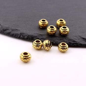 Metalna livena perla 9x6 mm, rupa 3.5mm…23MK12/618-DZL