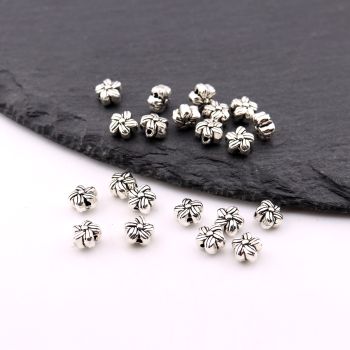 Metalna livena perla 6.5x4 mm, rupa 1mm…23MK12/630-B