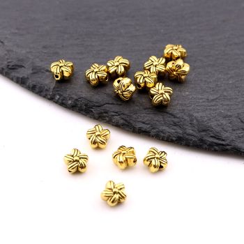 Metalna livena perla 6.5x4 mm, rupa 1mm…23MK12/630-DZL