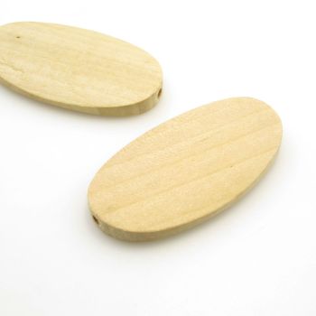 Drvene ukrasne perle. Dimenzije 55x30x6.5mm, rupa oko 4 mm. Natur drvo bez laka i boje. ( DP007)