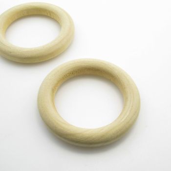 Drvene ukrasne perle. Dimenzije 50x8 mm,  otvor 33 mm. Natur drvo bez laka i boje ( DP014 )