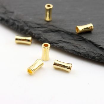 Perla ukrasna 7x3,5x2,2mm, rupa oko 2 mm- Pozlata 18k. (  23MK51G )