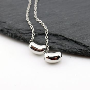 Perla ukrasna 10x6,3x2,2mm, rupa oko 2mm- Rodijum (  23MK39P )