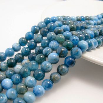 Prirodni Apatit A grade, Dimenzjia 6 mm. Cena je data za niz od oko 65 perli. ( KPAPAT6A )